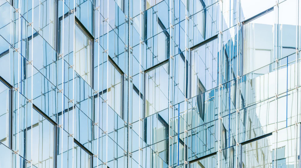 Glass facade of a modern IT park office building